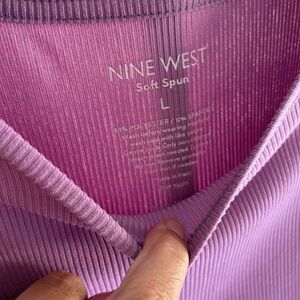 Lilac Nine West tee in size large.